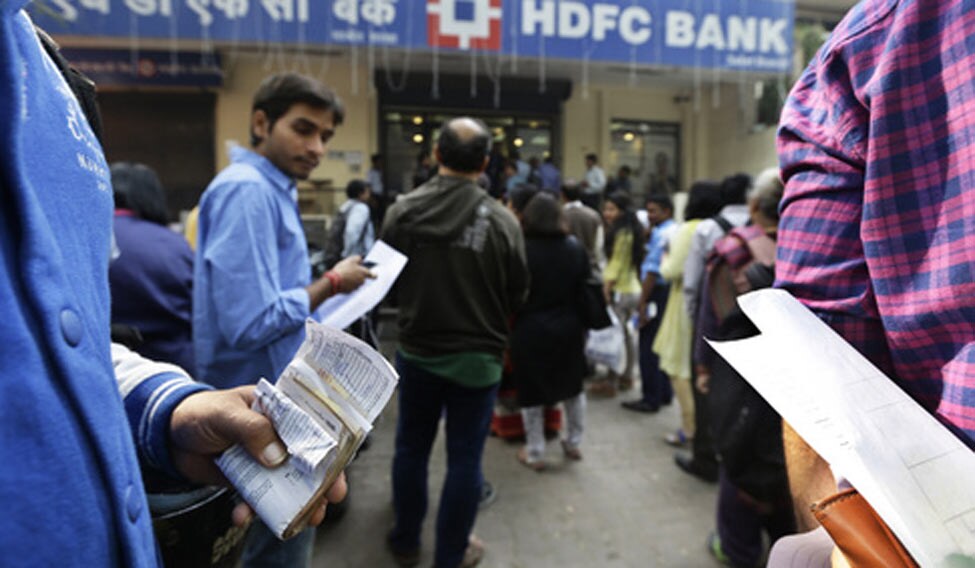 Banks reopen; people make a beeline to deposit, change notes
