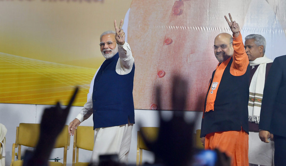 BJP retains Gujarat, sweeps Himachal; Congress claims 'moral victory'