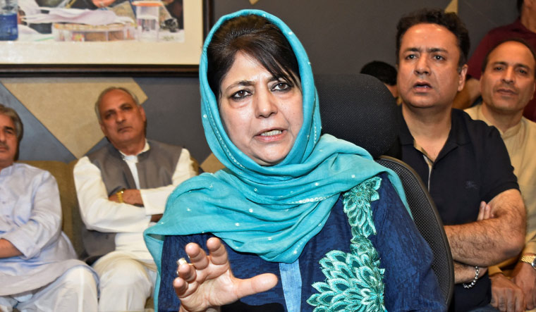[FILE] Former Jammu and Kashmir Chief Minister Mehbooba Mufti gestures as she addresses a news conference in Srinagar on June 19 | PTI