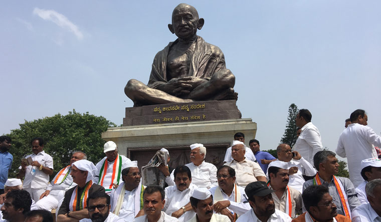 Congress leaders staging protest in front of the Gandhi statue near Vidhana Soudha in Bengaluru | Bhanu Prakash Chandra