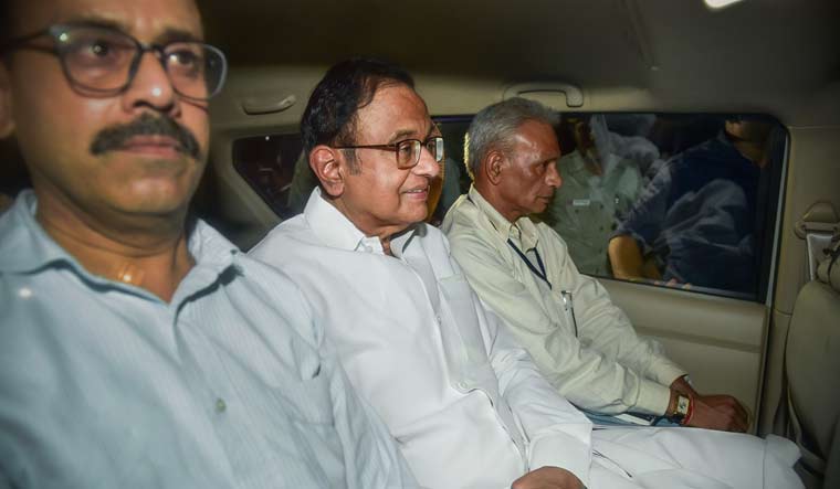 CBI officials arrest Congress leader P. Chidambaram from his Jor Bagh residence in New Delhi | PTI