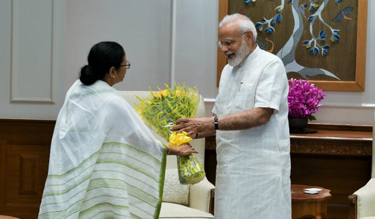 West Bengal CM Mamata Banerjee greets Prime Minister Narendra Modi| Twitter/PMO