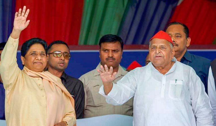 Mayawati, Mulayam Singh Yadav end rivalry, share dais at rally