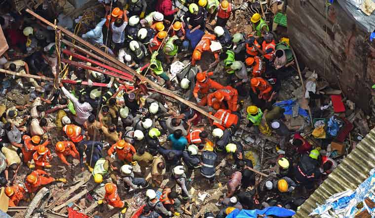 Rescuers work at the site of a building that collapsed in Mumbai | Vishnu V Nair/Manorama