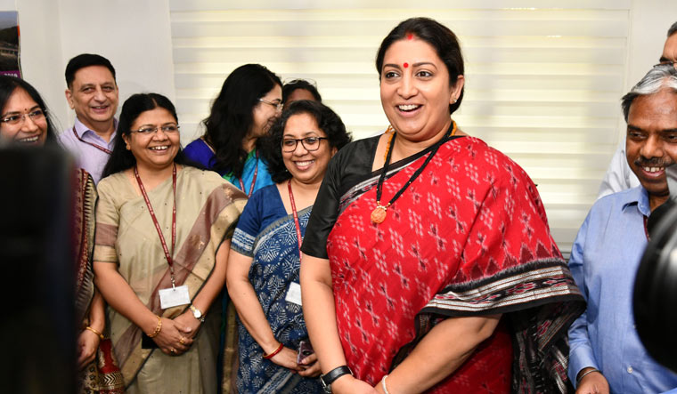 Smriti Irani is greeted as she takes charge as Minister of Women and Child Development at her office, in New Delhi | Sanjay Ahlawat