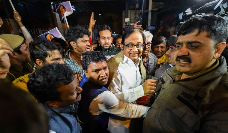 Senior Congress leader P. Chidambaram is surrounded by party workers after he was released from Tihar jail | PTI