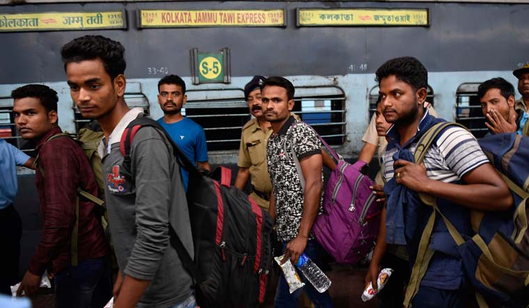 Labourers who arrived at Kolkata railway station  Salil Bera