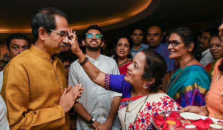 Shiv Sena president Uddhav Thackeray being greeted after he was chosen as the nominee for Maharashtra chief minister's post by Shiv Sena-NCP-Congress alliance | PTI