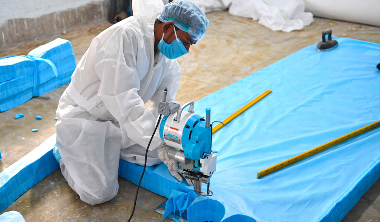 A worker is making personal protective equipment in Kolkata | Salil Bera