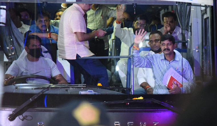 Maharashtra CM Eknath Shinde and rebel Shiv Sena MLAs leave from the Mumbai airport in a bus, after arriving from Goa | PTI