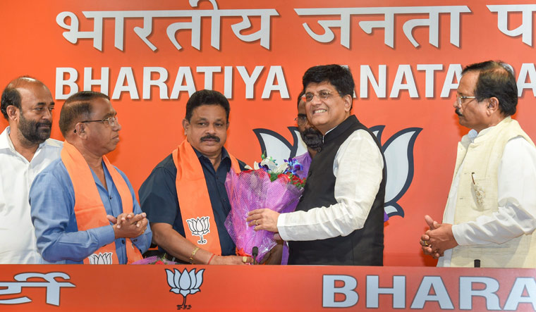 Former Congress legislators from Goa, Subhash Shirodkar and Dayanand Sopte, being felicitated by Union minister Piyush Goyal on joining the BJP, in New Delhi | PTI