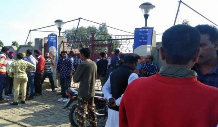 People gather near the blast site at Amritsar