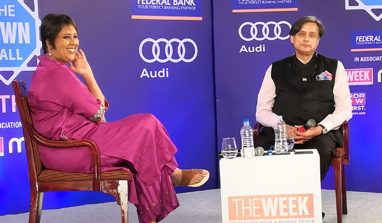 Tharoor with Barkha Dutt