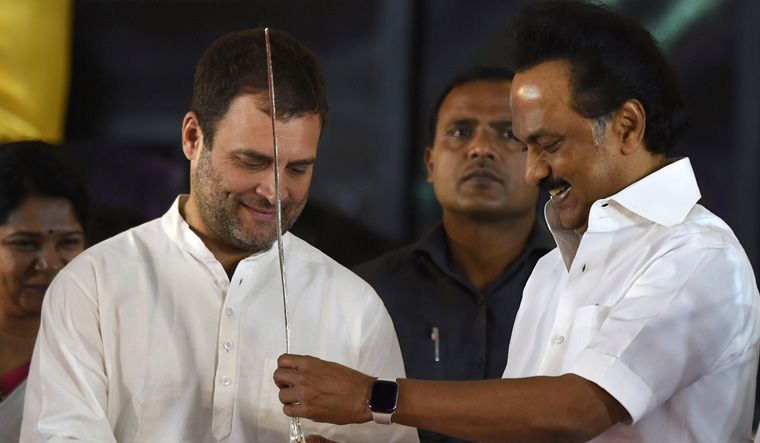 Congress president Rahul Gandhi is being presented a sword by DMK president MK Stalin at a public meeting in Chennai | PTI