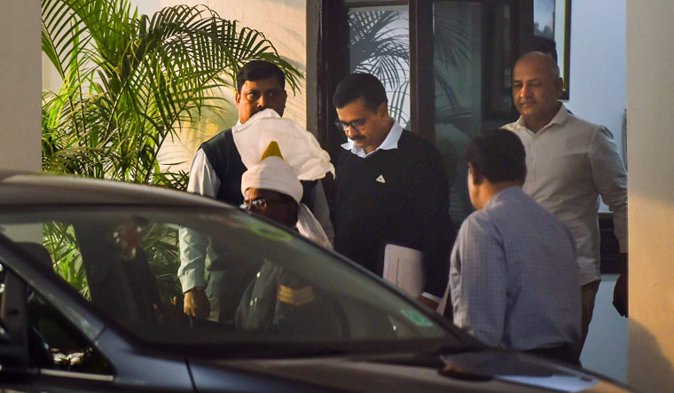 Delhi Chief Minister Arvind Kejriwal and Deputy CM Manish Sisodia come out after meeting Lt Governor Anil Baijal at his residence in New Delhi | PTI