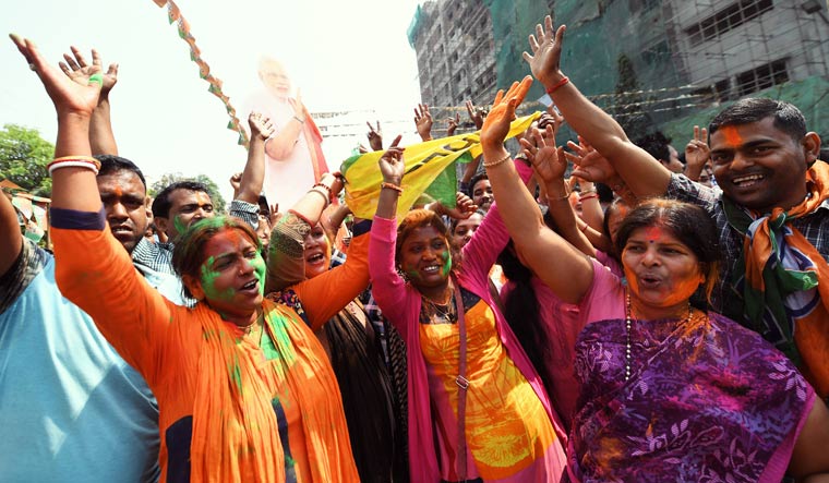 BJP supporters celebrate party's victory in the Tripura Assembly elections in Agartala | Salil Bera