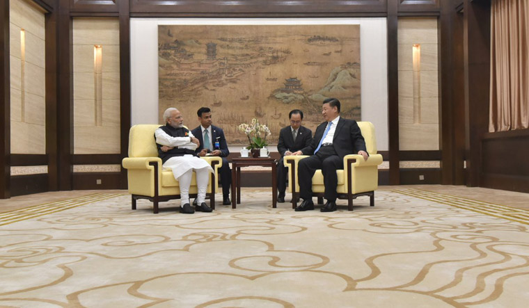 Prime Minister Narendra Modi with China President Xi Jinping in Wuhan, China | Twitter/PIB_India