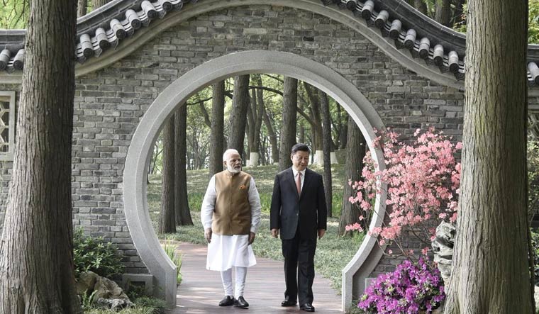 Prime Minister Narendra Modi and President Xi Jinping during a walk along the East Lake in Wuhan | Twitter/PMOIndia