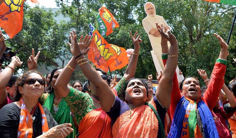 [FILE] BJP supporters celebrate in Bengaluru on the counting day of Karnataka Assembly elections | AFP