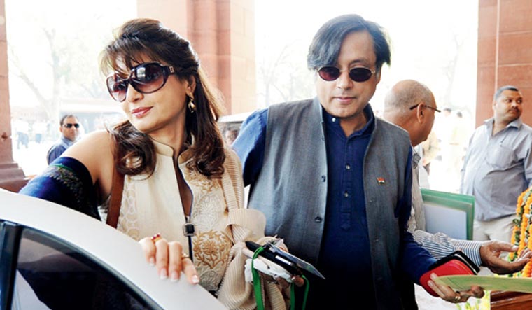 [FILE] Sunanda Pushkar and Shashi Tharoor | AFP