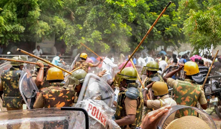 Police personnel baton charge at protesters who were demanding the closure of Vedanta's Sterlite Copper unit in Thoothukudi on Wednesday | PTI