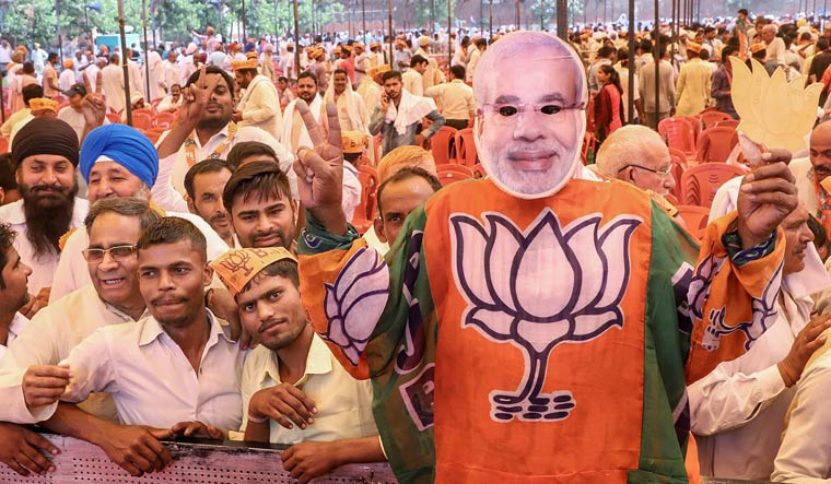 BJP supporters during Uttar Pradesh Chief Minister Yogi Adityanath's rally ahead of Kairana Assembly by-polls, in Shamli on Thursday | PTI