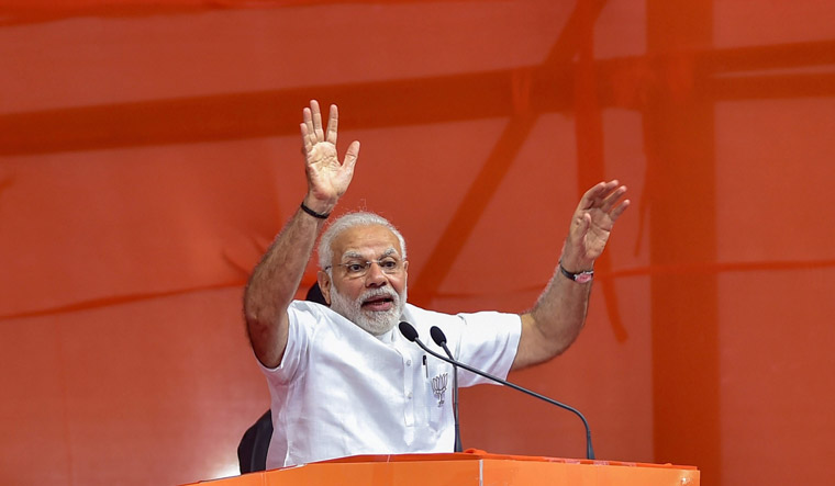 [FILE] Prime Minister Narendra Modi addresses a public rally for the Karnataka assembly elections, in Bengaluru on Thursday | PTI