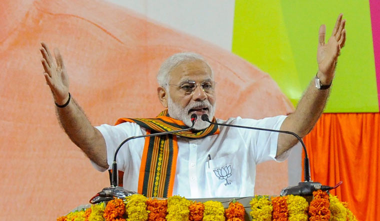 Prime Minister Narendra Modi addressing at an election campaign rally in Mangaluru | PTI