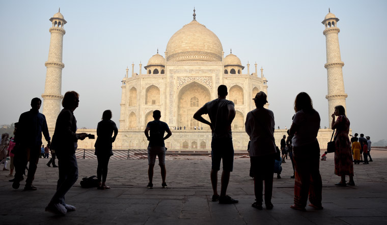 [FILE] Tourists visit Taj Mahal in Agra | AP