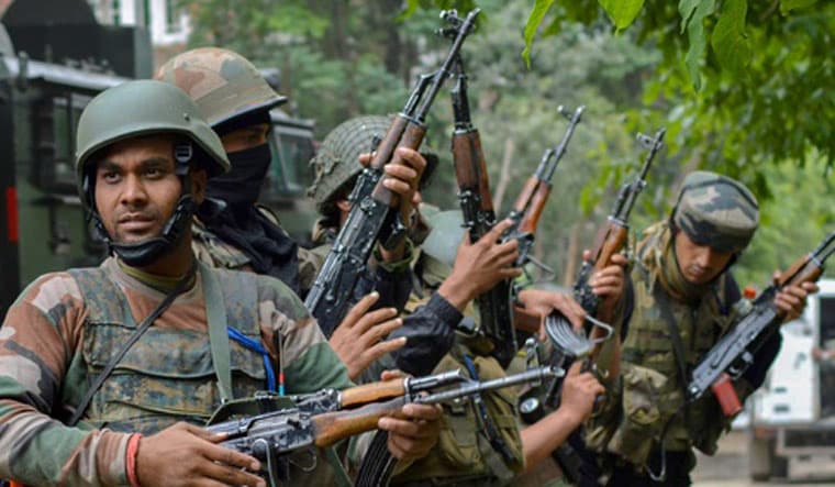 Army personnel take position during an encounter with militants | PTI
