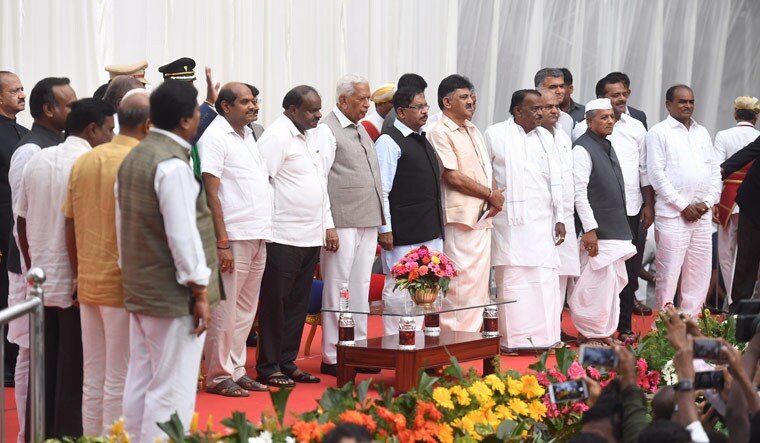 The newly inducted ministers with Governor Vajubhai Vala and Chief Minister H.D. Kumaraswamy | Bhanu Prakash Chandra