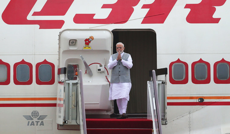 Prime Minister Narendra Modi arrives at Qingdao Liuting International Airport | AFP
