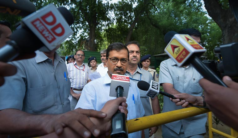 Delhi Chief Minister Arvind Kejriwal talks to the media after meeting Home Minister Rajnath Singh at his residence | PTI