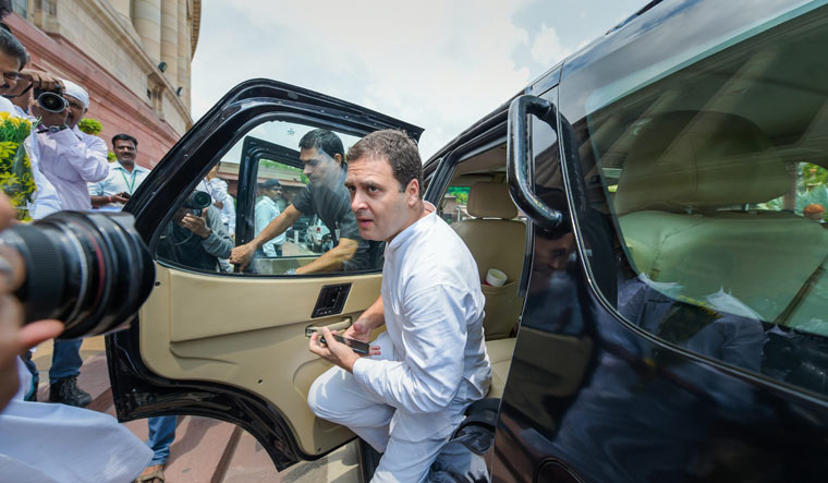 Congress President Rahul Gandhi arrives to attend the Monsoon Session of Parliament, in New Delhi on Wednesday | PTI