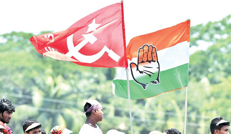 [FILE] Congress and CPI(M) flags | PTI