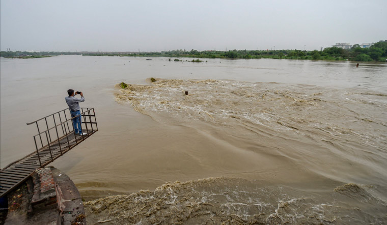 A view of Yamuna River as it crosses the danger mark following heavy rainfall , in New Delhi | PTI