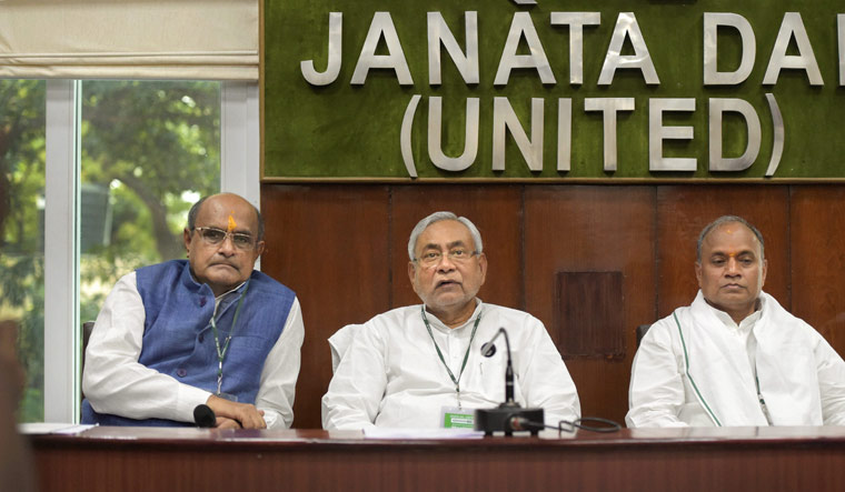 Bihar Chief Minister and JD(U) chief Nitish Kumar, general secretary K.C. Tyagi (L) and general secretary (organisation), R.C.P. Singh during National Executive meeting at party headquarters in New Delhi | PTI