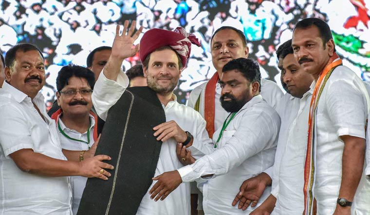 Congress president Rahul Gandhi being felicitated by party leaders during a public meeting at Sarooagar Stadium ground near Hyderabad | PTI