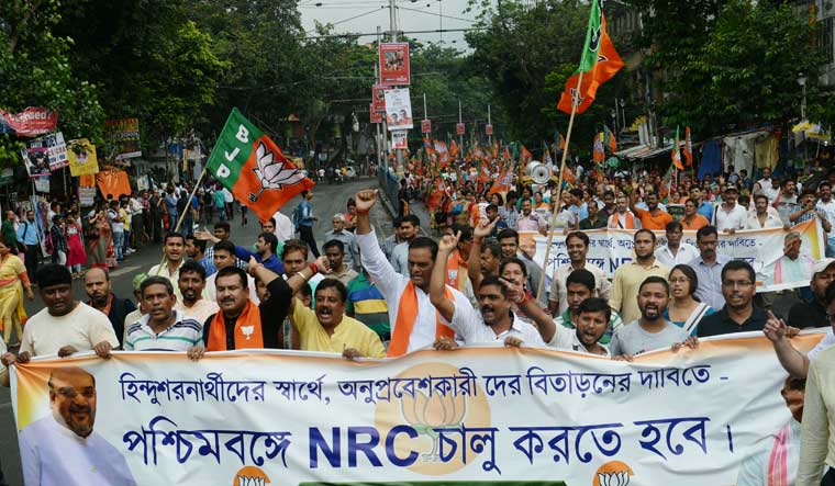 BJP workers taking out a rally in Kolkata demanding publication of NRC in West Bengal | Salil Bera