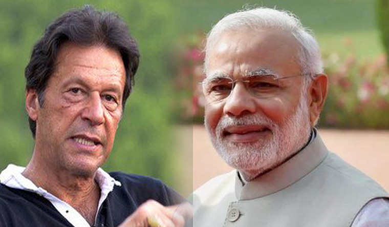 Pakistan Tehreek-i-Insaf chief Imran Khan and Indian Prime Minister Narendra Modi 