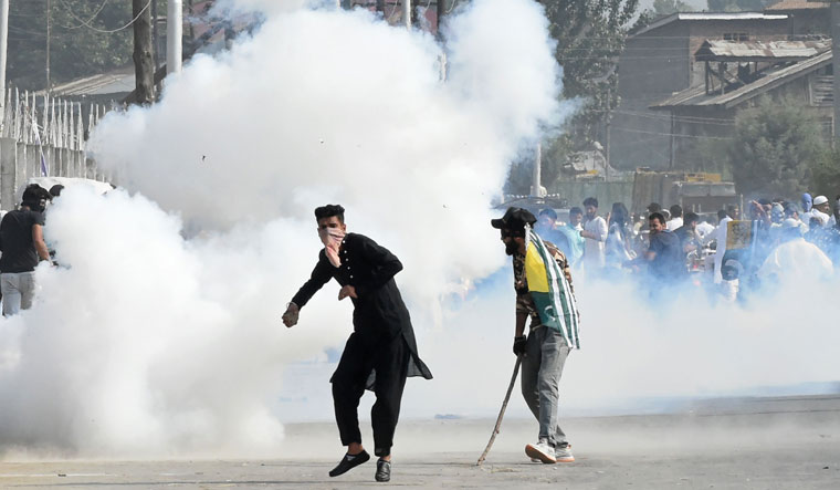 Kashmiri protesters clash with government forces after Eid prayers in downtown Srinagar | PTI