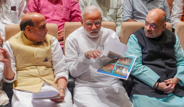 Prime Minister Narendra Modi along with BJP chief Amit Shah and Home Minister Rajnath Singh | PTI