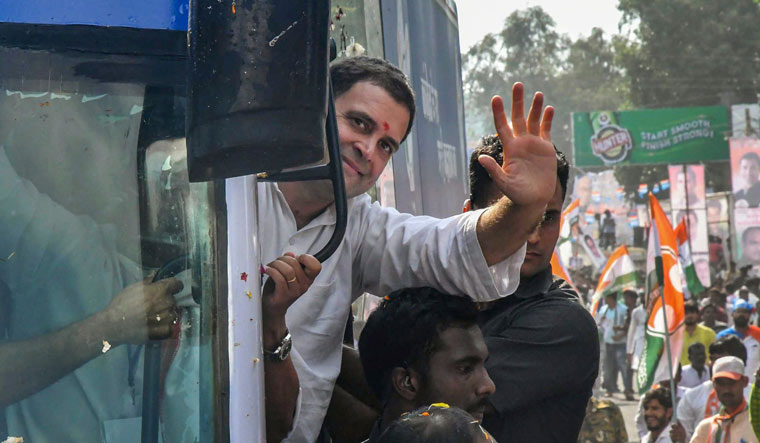 Congress president Rahul Gandhi waves at the supporters at a roadshow in Bhopal on Monday | PTI