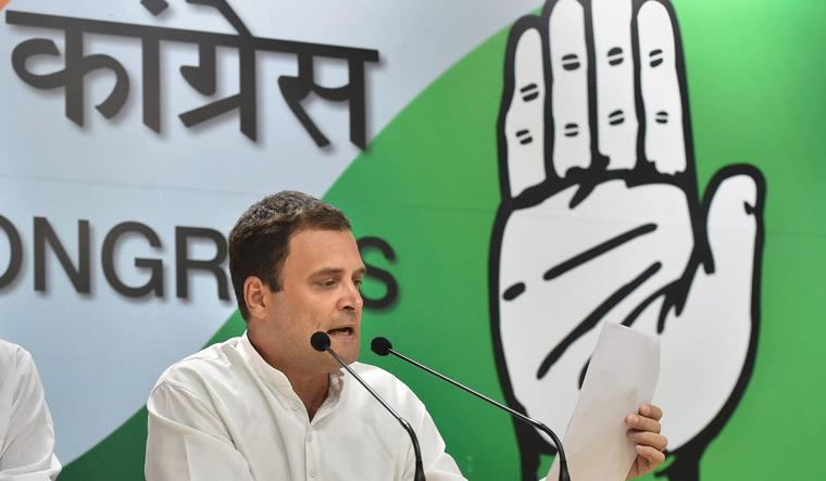 [File] Congress president Rahul Gandhi gestures while addressing the media on Rafale deal issue, in New Delhi, Saturday | PTI