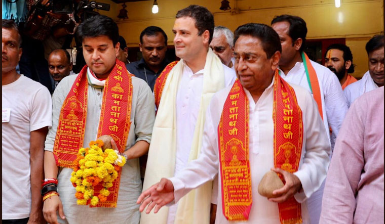 Rahul Gandhi, along with PCC chief Kamalnath and Congress campaign committee chief Jyotiraditya Scindia, at Chitrakoot temple