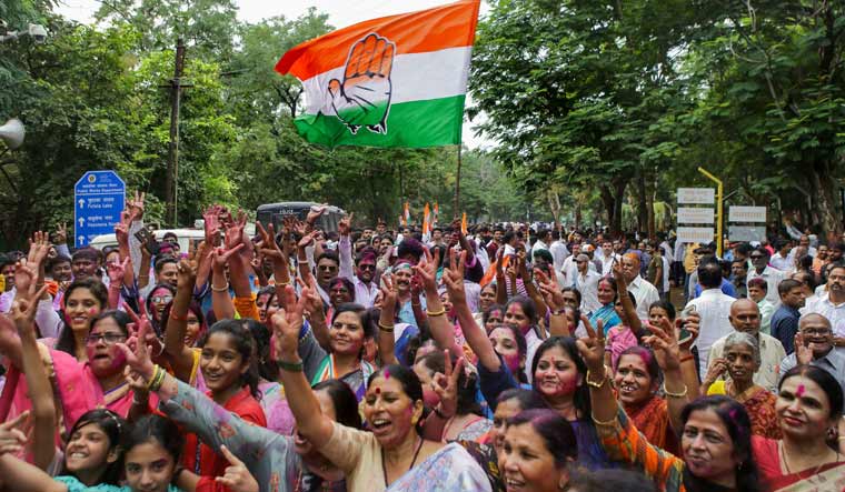 Congress supporters celebrate party candidate's Vikas Thackeray's victory in Assembly elections, in Nagpur | PTI