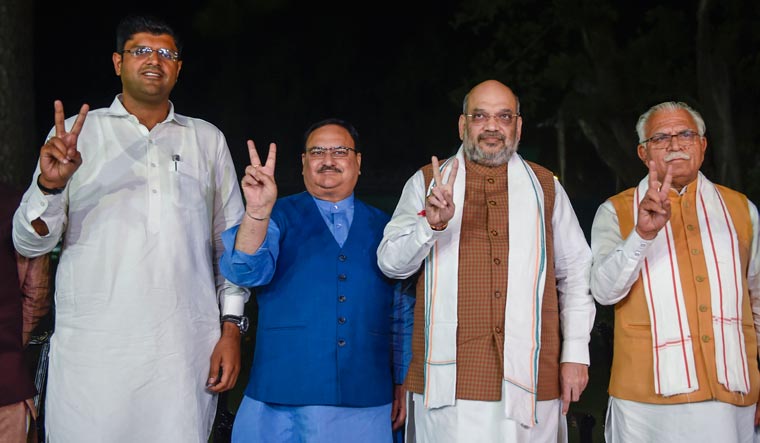 Home Minister Amit Shah, BJP Working President JP Nadda, Haryana Chief Minister Manohar Lal Khattar, and JJP leader Dushyant Chautala during a press conference in New Delhi | PTI