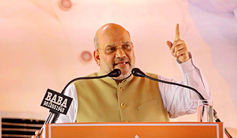 Union Home Minister Amit Shah addresses a public meeting ahead of Haryana Assembly elections, in Bhiwani| PTI