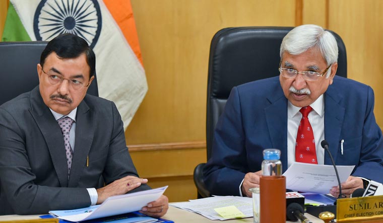 Chief Election Commissioner Sunil Arora with Election Commissioner Sunil Chandra during a press conference to announce the schedule for Jharkhand Assembly polls in New Delhi | PTI