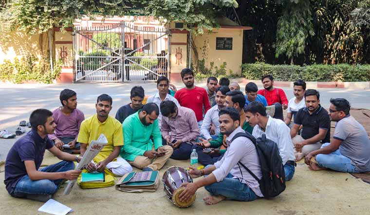 Students stage a protest dharna at Banaras Hindu University (BHU) against the appointment of a Muslim teacher of Sanskrit at the university | PTI